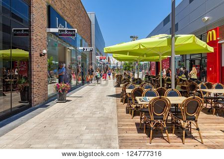 ASHDOD, ISRAEL - JULY 24, 2015: Shops and boutiques in open mall - owned by BIG Shopping Centers Ltd., founded in 1994 and operates in four countries - Israel, the United States, India and Serbia.