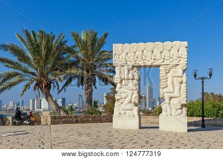 JAFFA, ISRAEL - JULY 21, 2015: Gate of Faith -  large statue at the Peak Park of Jaffa made of Galilee stone by sculptor Daniel Kafri between 1973-1975, represents promise of the land to Patriarchs. 