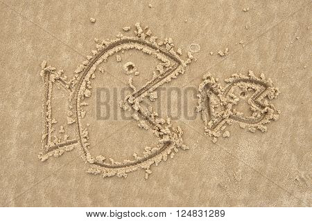 big fish eat small fish on sand
