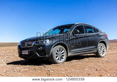 ANTOFAGASTA, CHILE - NOVEMBER 16, 2015: New black crossover BMW F26 X4 in the Atacama desert.