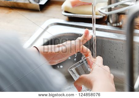 House Work,Close up image of washing dishes.