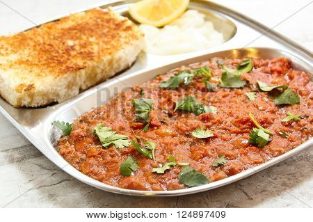 Pav bhaji Masala Indian street food on steel plate