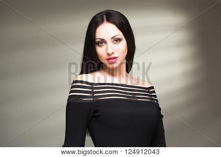 sexy girl model with shadow from the blinds