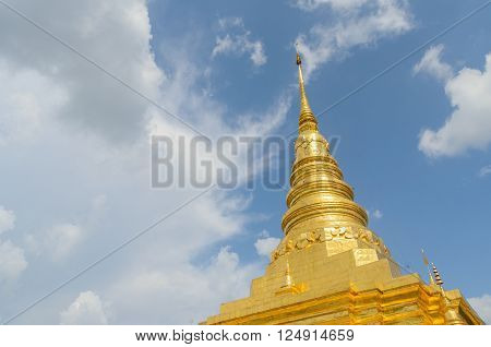 Golden pagoda and blue sky in Phra That Chae Haeng temple, nan province thailand