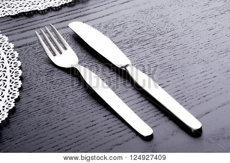Fork and knife resting neatly on the table