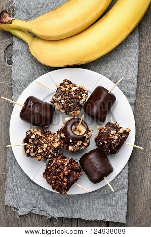 Frozen banana and fresh fruits top view country style