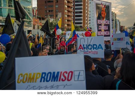 Quito, Ecuador - April 7, 2016: Group of people Holding protest signs, police and journalists during anti government protests in Shyris Avenue.
