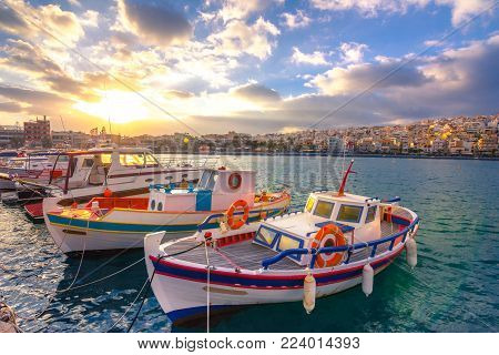 The pictursque port of Sitia, Crete, Greece at sunset. Sitia is a traditional town at the east Crete near the beach of palm trees, Vai.