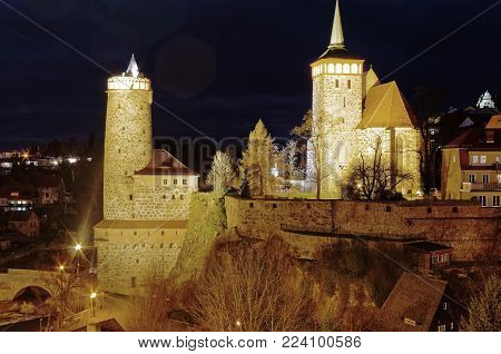 Illuminated fortress at night in Bautzen in the federal state of Saxony in Germany