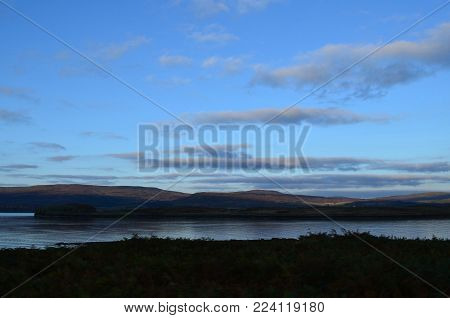 Beautiful blue skies landscape in Isle of Skye