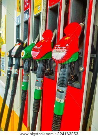 Prague, Czech Republic - January 2, 2018: Filling nozzles at a Shell gas station at Prague, Czech Republic on January 2, 2018. Shell is an Anglo-Dutch multinational oil and gas company headquartered in the Netherlands.