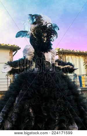 Romantic portrait of elegant carnival mask at sunset