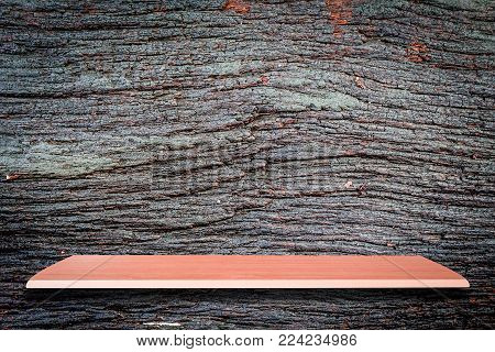 Empty Top Wooden Shelves And Wooden Wall Background For Product Display