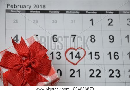 calendar with red mark on 14 February. Valentine's day concept