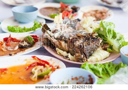 Depleted Som-Tum papaya salad Esan thai menu fish grilled, Finished eating