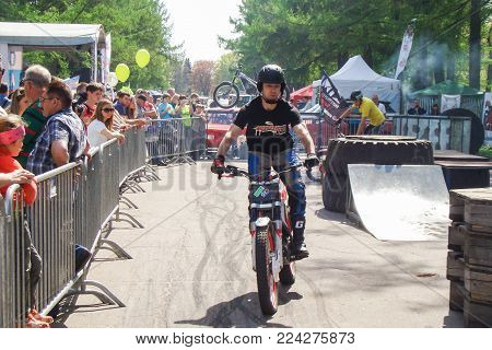 St. Petersburg, Russia - 18 May, Passage along the spectators, 18 May, 2014.
Demonstration races athletes mototral to the audience.