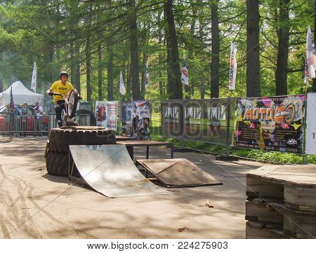 St. Petersburg, Russia - 18 May, The biker performs a trick, 18 May, 2014.
Demonstration races athletes mototral to the audience.