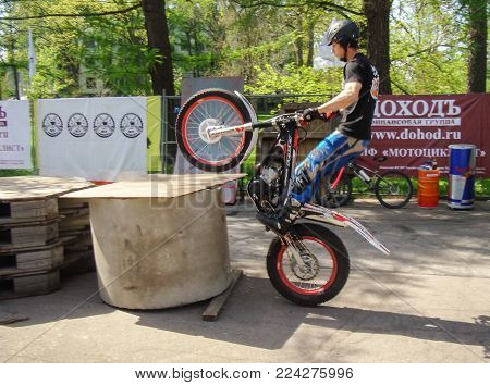 St. Petersburg, Russia - 18 May, Arrival at the obstacle, 18 May, 2014.
Demonstration races athletes mototral to the audience.