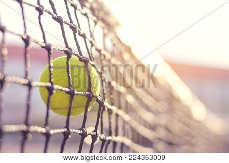 Close Up Tennis Ball Hitting To Net