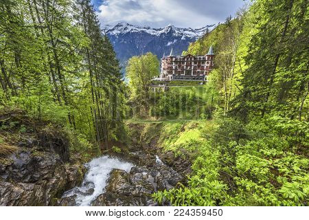 View On Giessbach Waterfall And The Hotel In Swiss Alps