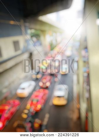 Blurred Image Of Car On Evening Treaffic Jam Hour In Bangkok Thailad With Electric Sky Train Station