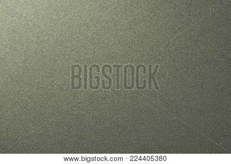 Sandpaper surface. Abrasive material. The sandpaper texture.