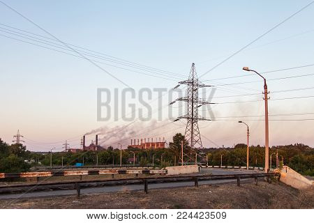 Old Metallurgical Works on the riverside. Industrial landscape
