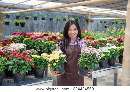 Smiling Woman Florist, Small Business Flower Shop owner