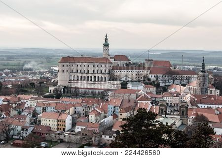 historical medieval Mikulov city with chateau and historical buildings from Olivetska hora hill in Palava mountains in Czech republic near borders with Austria