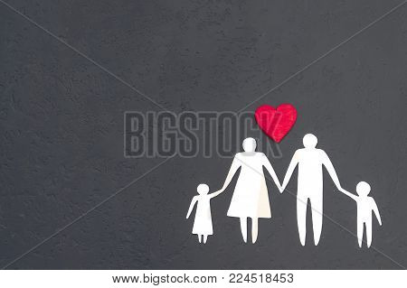 World Heart Day is a program to inform patients about the state of health. On a blue background a silhouette of a family and a red heart.