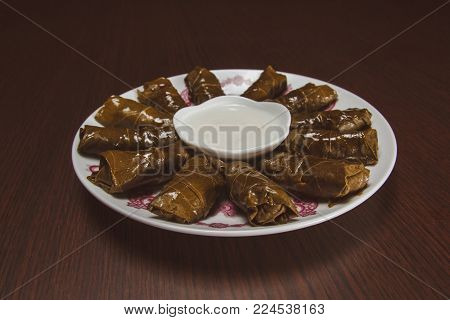 A plate of dolma, healthy food, grape leaves, cooking