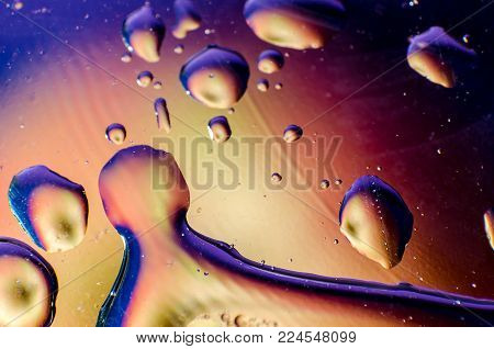 Texture Of A Drop Of Water On A White Glossy Surface