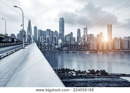 Andscape Of Downtown Near Water Of Chongqing In Blue Sky