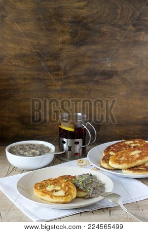 Potato Cutlets Or Pancakes With Mushroom Sauce And Green Onions. Rustic Style.