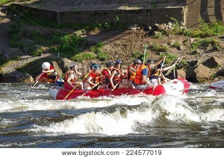 LOSEVO - AUGUST 18: Whitewater rafting on AUGUST 18, 2012 RUSSIA. Unidentified persons enjoy whitewater rafting on the Vuoksi river in Losevo, Leningrad region, Russia