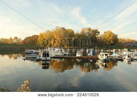 City marina on river in natural surrounding