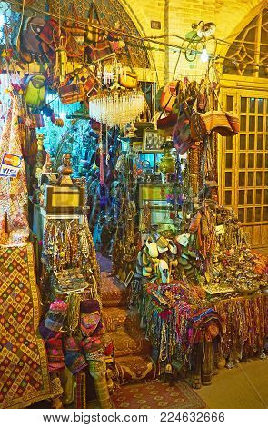 Shiraz, Iran - October 12, 2017: The Entrance To The Antique Souvenir Stall Of Vakil Bazaar Is Surro