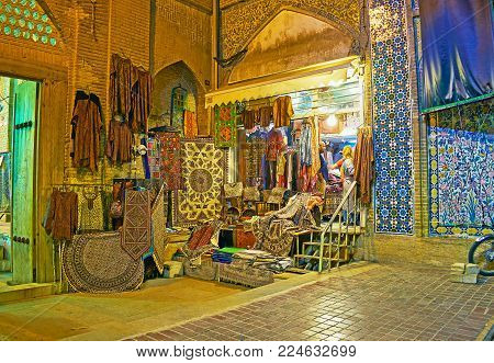 Shiraz, Iran - October 12, 2017: The Store With Tapestries, Carpets And Traditional Clothes Is Locat