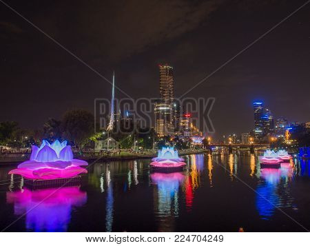 AUSTRALIA, MELBOURNE - February 22, 2015: Melbourne City and Yarra River with colorful illuminated decorations at Night