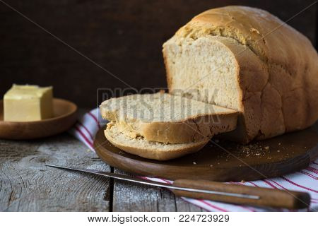 Fresh Fragrant Bread On The Table. Food Concept. Bakery, Crusty Loaves Of Bread And Buns. Assortment