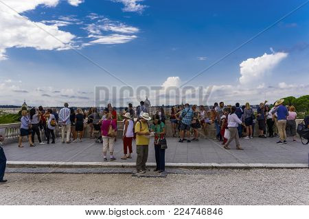 Rome, Italy - September 16 2017: Pincian Hill Promenade with crowd. Vatican view from Terrazza del Pincio to St. Peter Basilica.