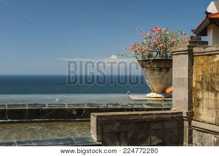 A beautiful view of an ocean or a sea from a very romantic place on Bali island. The best place to travel for romantic couples.