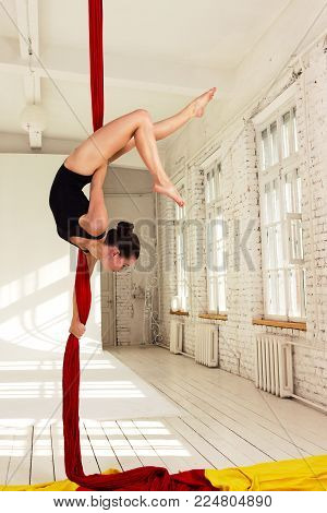 Girl Training On Aerial Silks