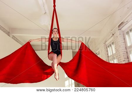 Girl Training On Aerial Silks
