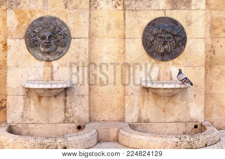 TARRAGONA,SPAIN-MARCH 9,2017:Old fountains in historic center of Tarragona,Spain.
