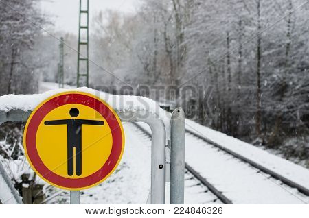 No Trespasing Sign On A Railway Platform During Winter.