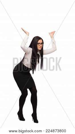 Young Caucasian Businesswoman In Formal Wear Holding Heavy Empty Space, Isolated On White