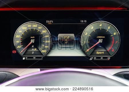 Modern Light Car Mileage (dashboard, Milage) Isolated On A Black Background. New Display Of A Modern
