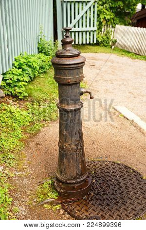 Old water pump at Norsk Folkemuseum, Oslo.