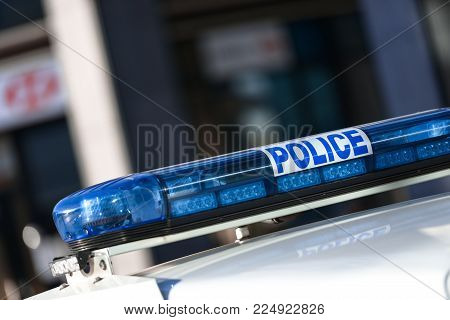 closeup on the roof-mounted lightbar of police car